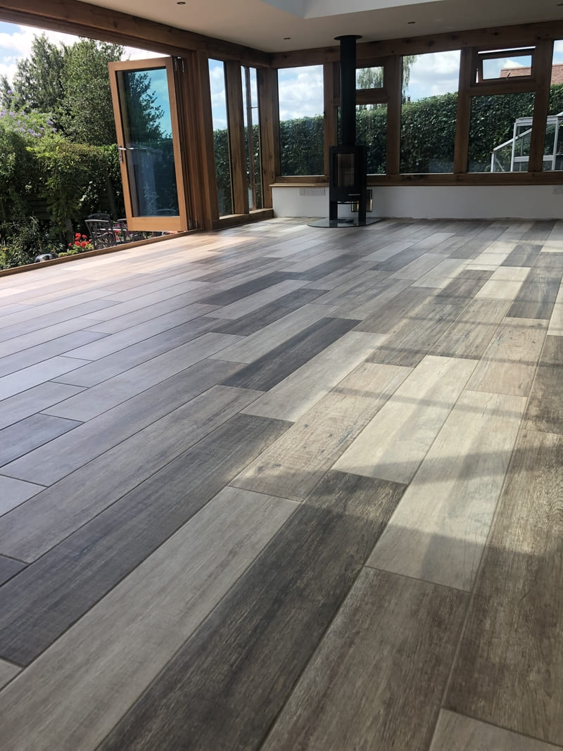 wood-plank effect porcelain tiling laid over heated floor